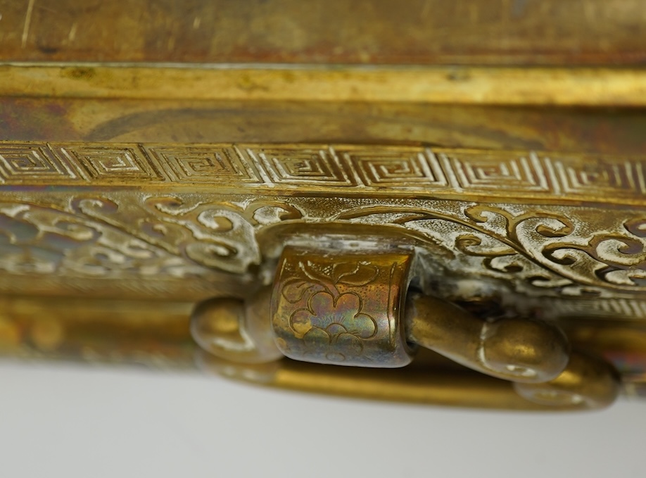 A large Chinese bronze rectangular censer and cover, Xuande seal mark, and a ‘plum blossom and chilong’ bronze censer, both 19th century